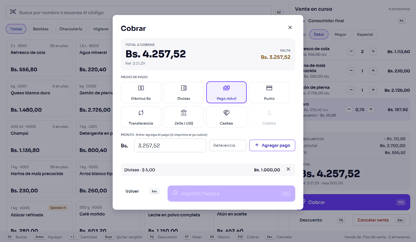 Captura de Sonir Negocios: el cobro de una venta con pago mixto en divisas y pago móvil, sobre la pantalla de caja.